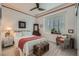 Cozy bedroom with white bedding, plantation shutters, and decorative chest at 1314 Doggett Ave, Las Vegas, NV 89123