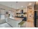 Modern kitchen with stainless steel appliances, sleek countertops, and ample cabinet space at 1314 Doggett Ave, Las Vegas, NV 89123