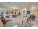Open-concept living and dining room with tile flooring and modern decor at 1314 Doggett Ave, Las Vegas, NV 89123