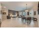 Bright and airy open-concept living and dining area with modern furnishings and natural light at 1314 Doggett Ave, Las Vegas, NV 89123