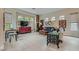 Spacious living room with large windows, neutral tones and modern finishes at 1314 Doggett Ave, Las Vegas, NV 89123