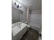 Bathroom with new vanity, toilet and shower over tub at 1345 N Hollywood Blvd, Las Vegas, NV 89110