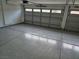 Spacious garage with epoxy flooring and automatic door for easy access and maintenance at 1345 N Hollywood Blvd, Las Vegas, NV 89110