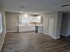 An open concept living area with a kitchen and stainless steel appliances at 1345 N Hollywood Blvd, Las Vegas, NV 89110
