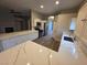 Bright kitchen features quartz countertops, stainless steel appliances, and wood-look floors at 1345 N Hollywood Blvd, Las Vegas, NV 89110