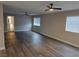 Open-concept living room featuring hardwood floors and natural light at 1345 N Hollywood Blvd, Las Vegas, NV 89110