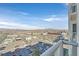 A spacious balcony offering expansive views of the city skyline and distant mountains at 150 Las Vegas Blvd # 1004, Las Vegas, NV 89101