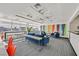 Well-lit lounge area with vibrant art, city views, and a comfortable meeting space at 150 Las Vegas Blvd # 1004, Las Vegas, NV 89101