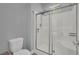 Bathroom with a shower featuring frameless glass doors and a rainfall shower head at 1525 Spiced Wine Ave # 12103, Henderson, NV 89074