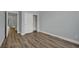 Neutral bedroom features wood-look floors and a double door closet at 1525 Spiced Wine Ave # 12103, Henderson, NV 89074