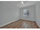 Clean bedroom offers wood-look floors, ceiling fan and one window to provide natural light at 1525 Spiced Wine Ave # 12103, Henderson, NV 89074