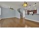 Bright and airy living space with hardwood floors and a staircase at 1525 Spiced Wine Ave # 12103, Henderson, NV 89074