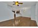 Open-concept living area with hardwood floors and staircase access at 1525 Spiced Wine Ave # 12103, Henderson, NV 89074