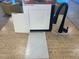 Selection board featuring white cabinet doors, sleek matte black faucet, and marbled quartz countertop at 1543 Pacific Baza St, Las Vegas, NV 89138