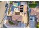Aerial view showcasing the home's roof, solar panels, pool, and driveway at 155 Fallon Dr, Henderson, NV 89074