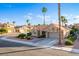 Charming single-story home boasts desert landscaping, a spacious driveway, and an attached two-car garage at 155 Fallon Dr, Henderson, NV 89074