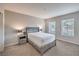 Simple bedroom with twin night stands featuring matching lamps at 173 Petaluma Valley Dr, Las Vegas, NV 89138
