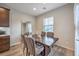 Cozy dining area featuring a modern mirror and stylish striped chairs at 173 Petaluma Valley Dr, Las Vegas, NV 89138