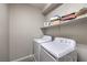 Well-equipped laundry room with modern washer and dryer units at 173 Petaluma Valley Dr, Las Vegas, NV 89138