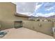 Spacious outdoor patio area with garden bed at 173 Petaluma Valley Dr, Las Vegas, NV 89138