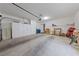 Spacious garage with ample storage cabinets and room for vehicles and projects at 1912 Summer Pine Ct # 102, Las Vegas, NV 89134