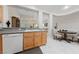 Functional kitchen area with a breakfast nook, granite counters, and modern appliances at 1912 Summer Pine Ct # 102, Las Vegas, NV 89134