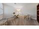 Dedicated home office featuring carpeted floors, a bookshelf, natural light, and neutral paint at 1912 Summer Pine Ct # 102, Las Vegas, NV 89134