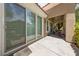 Covered patio features a ceiling fan and seating area, perfect for outdoor relaxation and entertaining at 1912 Summer Pine Ct # 102, Las Vegas, NV 89134