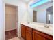 Bathroom with double sinks, ample counter space, and a large mirror that reflects natural light at 1995 Sundown Canyon Dr, Henderson, NV 89014