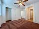 Bedroom with a closet, ceiling fan and windows that provide natural light and ventilation at 1995 Sundown Canyon Dr, Henderson, NV 89014