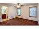 A spacious bedroom features a ceiling fan and dual windows that let in natural light at 1995 Sundown Canyon Dr, Henderson, NV 89014