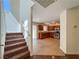 Open entryway with stairs leading to a spacious kitchen at 1995 Sundown Canyon Dr, Henderson, NV 89014