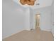Neutral bedroom with tile flooring and access to en-suite bathroom at 2328 Fossil Canyon Dr, Henderson, NV 89052
