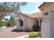 Charming house showcasing a beautiful terracotta tile roof and desert landscaping at 3001 Anna Bay Dr, Las Vegas, NV 89134
