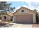 A lovely one-story home featuring a two-car garage and beautifully designed tile roofing at 3001 Anna Bay Dr, Las Vegas, NV 89134
