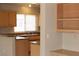 Traditional kitchen featuring stainless steel appliances and bar seating to a casual dining area at 3001 Anna Bay Dr, Las Vegas, NV 89134