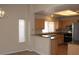 Bright eat-in kitchen with stainless steel appliances and open to dining area at 3001 Anna Bay Dr, Las Vegas, NV 89134