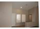 Neutral living space with a half wall and tile flooring at 3001 Anna Bay Dr, Las Vegas, NV 89134