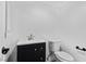 Bathroom with single sink vanity, toilet, and neutral wall color at 3217 Harbor Vista St, Las Vegas, NV 89117
