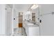 Bathroom featuring dual sinks, gray granite countertops, and white cabinetry at 3217 Harbor Vista St, Las Vegas, NV 89117
