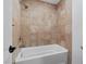 A bathroom showcasing a tiled shower over a tub at 3217 Harbor Vista St, Las Vegas, NV 89117