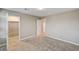 This bedroom features carpeted floors with white trim and doors at 3760 Paseo De Paz Ave, Las Vegas, NV 89115