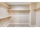 Walk-in closet with built-in shelves and rods, providing ample storage space at 3760 Paseo De Paz Ave, Las Vegas, NV 89115