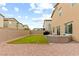 Beautiful backyard features artificial grass, rock landscaping and patio furniture set at 4039 Beech Fern Ave, North Las Vegas, NV 89084