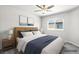 Cozy bedroom features neutral colors, comfortable bed, and a bright, airy feel at 4039 Beech Fern Ave, North Las Vegas, NV 89084