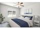 Comfortable bedroom featuring neutral decor, bright window, and a serene atmosphere at 4039 Beech Fern Ave, North Las Vegas, NV 89084