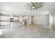 Spacious kitchen seamlessly connected to the living area, perfect for modern living and entertaining at 4039 Beech Fern Ave, North Las Vegas, NV 89084