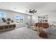 Inviting living room with comfortable seating and stylish decor; perfect for entertaining at 4039 Beech Fern Ave, North Las Vegas, NV 89084