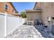 Fenced backyard, featuring tilework and various utilities at 4225 Telstar Ct, North Las Vegas, NV 89032