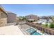 View of backyard and neighborhood from balcony with elevated spa at 4225 Telstar Ct, North Las Vegas, NV 89032